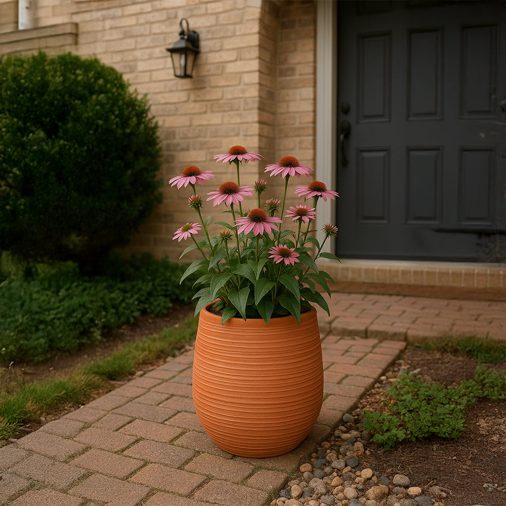 Jardinera decorativa de terracota con forma de barril acanalado