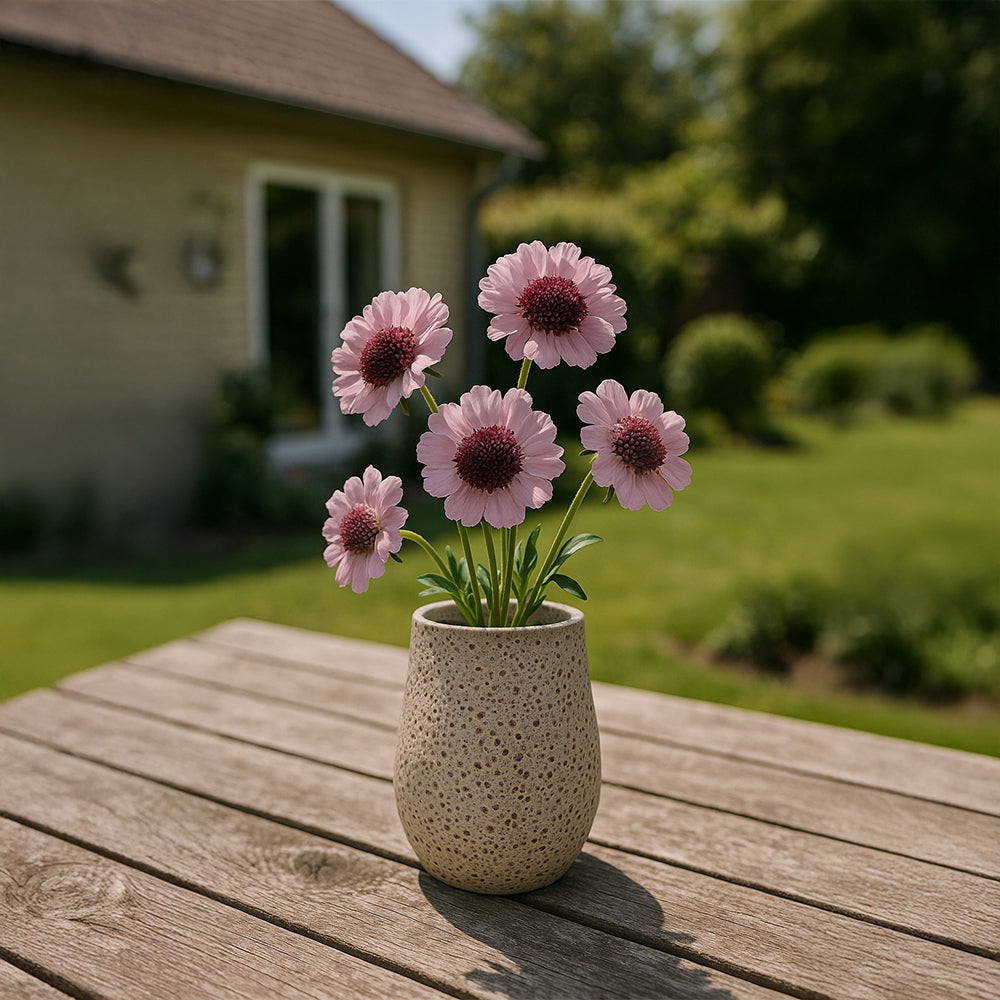 Maceta de cerámica con textura de piedra volcánica