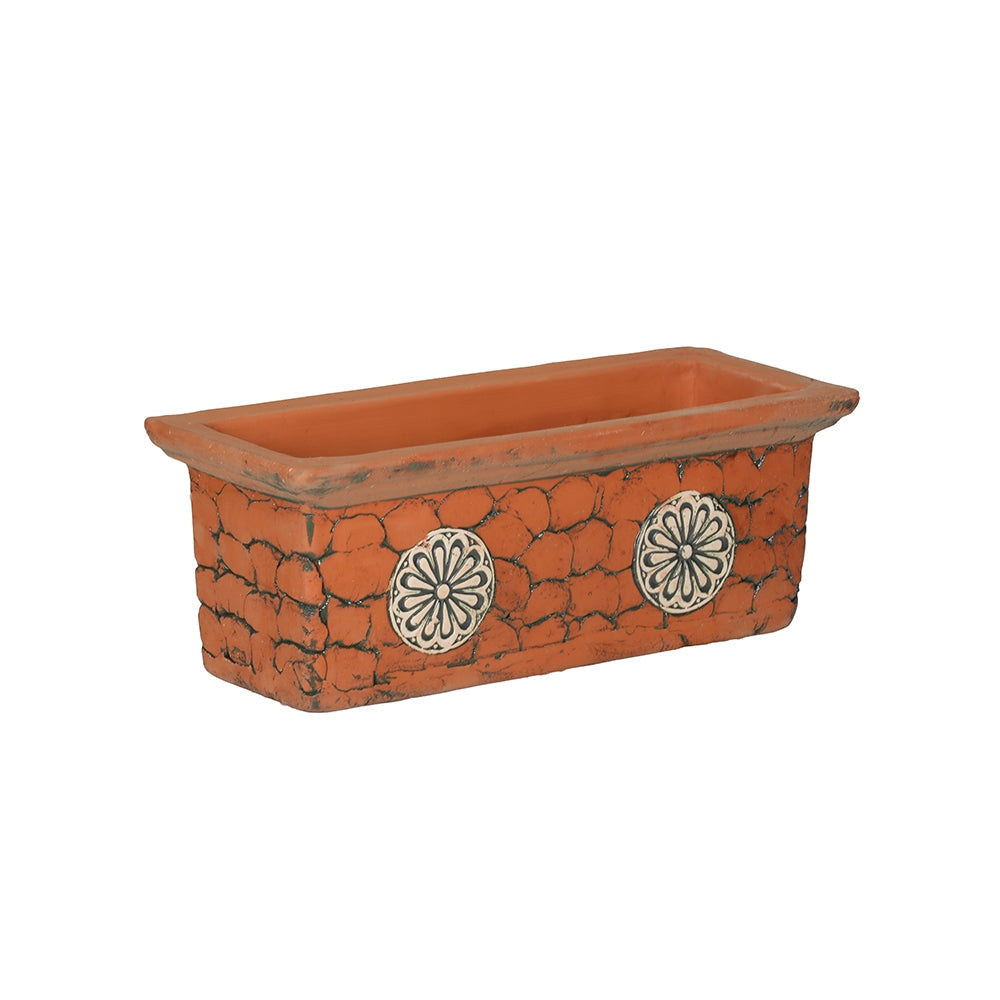 Maceta de terracota para exterior con ladrillo en relieve