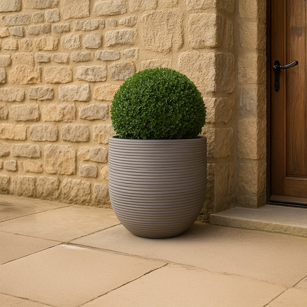 Gray ribbed glazed ceramic decorative planter, handmade by Clayspire.